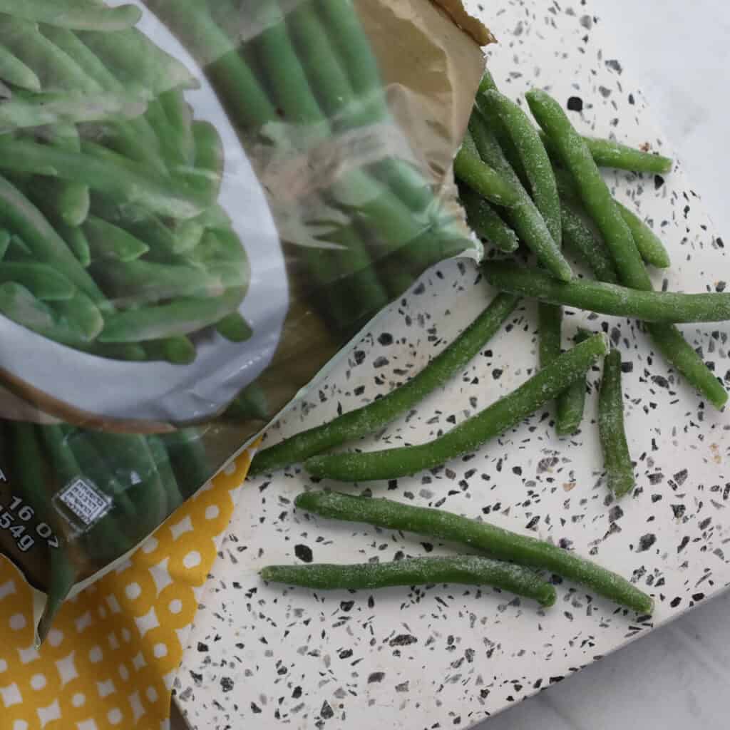 the frozen green beans air fryer recipe starts with your favorite brand of green beans