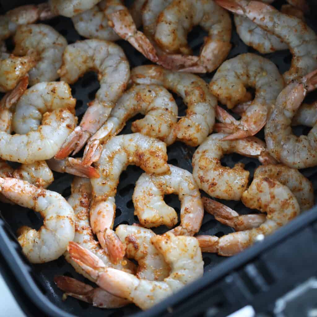 the healthy air fryer shrimp after cooking for 1 minute