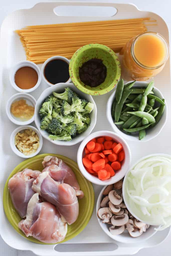 instant pot lo mein ingredients on a white tray