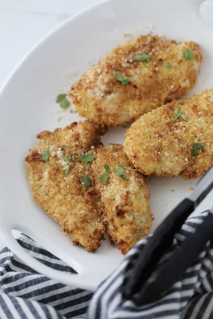 air fryer chicken cutlets recipe ready to eat garnished with cheese