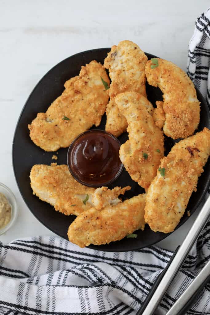 air fryer keto chicken tenders with parmesan and sauce to dip