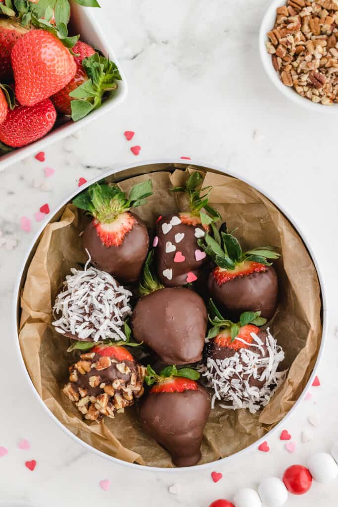valentines day chocolate covered strawberries garnished in a tin ready to eat