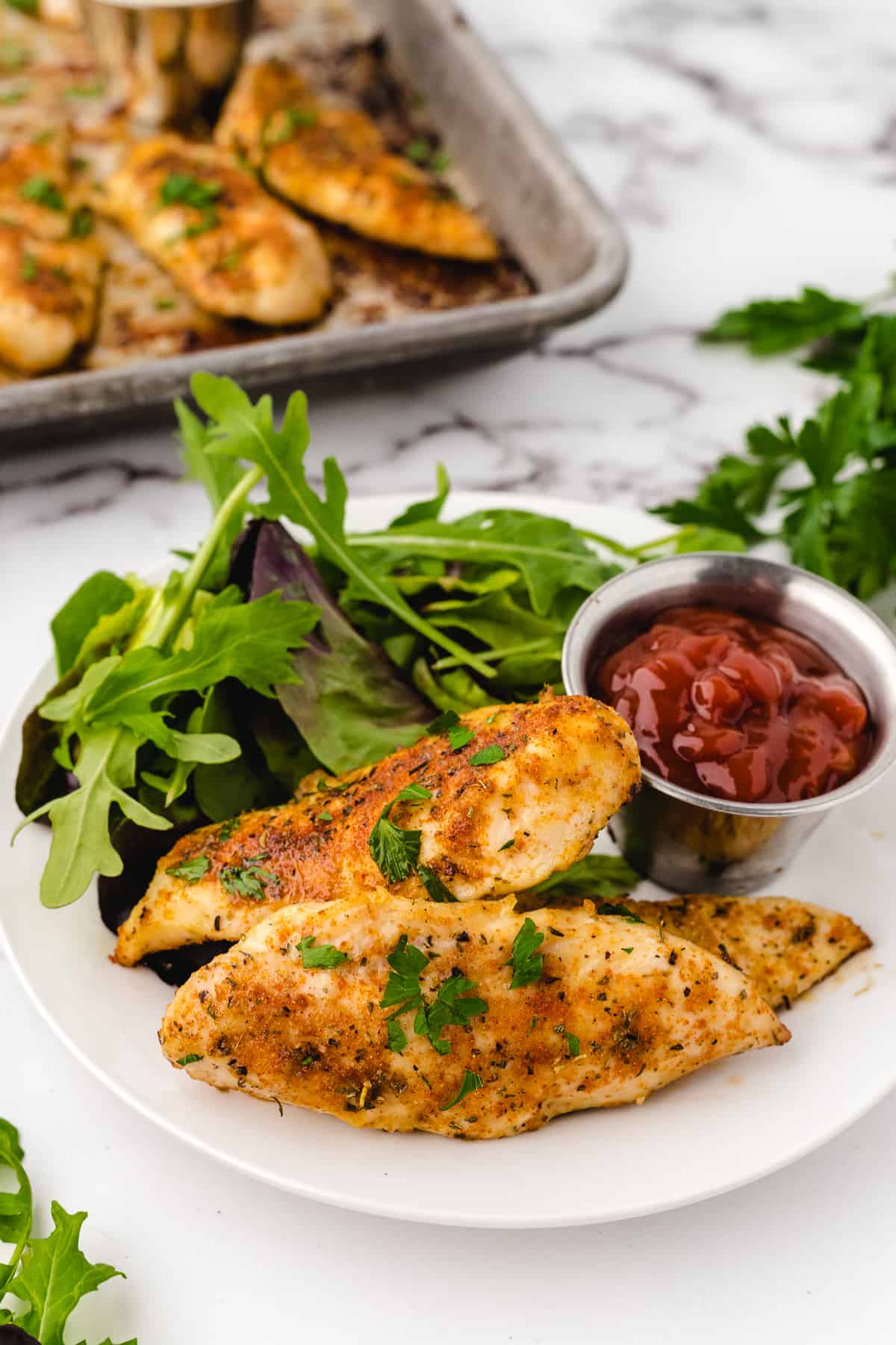 what to serve with chicken tenderloin after baking on a plate with salad and sauce