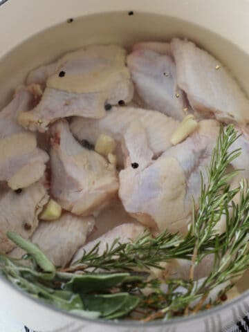 brining chicken wings with herb and seasoning before cooking them