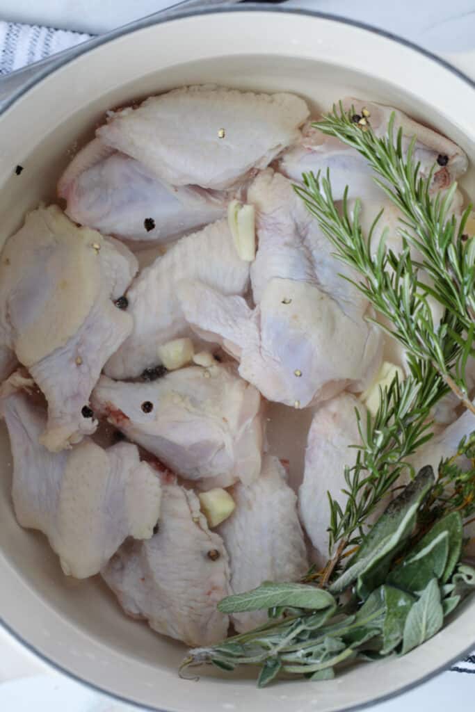 easy chicken wing brine recipe in a large white pot