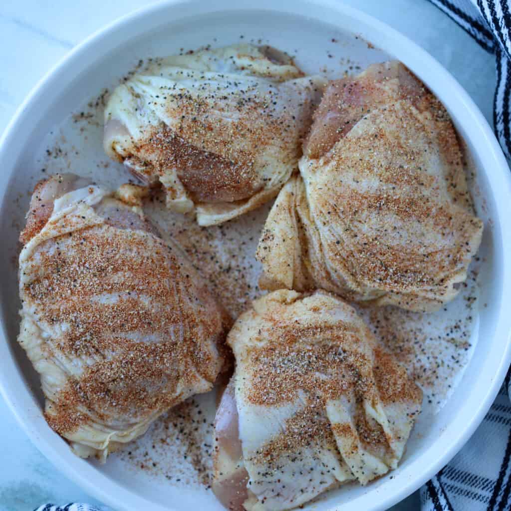 season the bone in chicken thighs air fryer recipe before cooking them