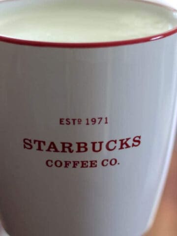 iced matcha green tea latte in a mug