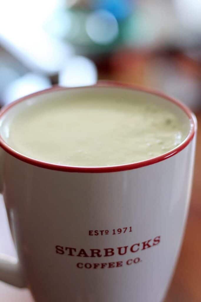 iced matcha latte recipe in a starbucks mug