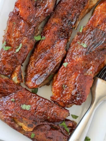 country style ribs in air fryer after cooking brushed with sauce