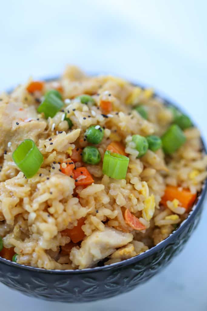 air fryer chicken fried rice in a black bowl