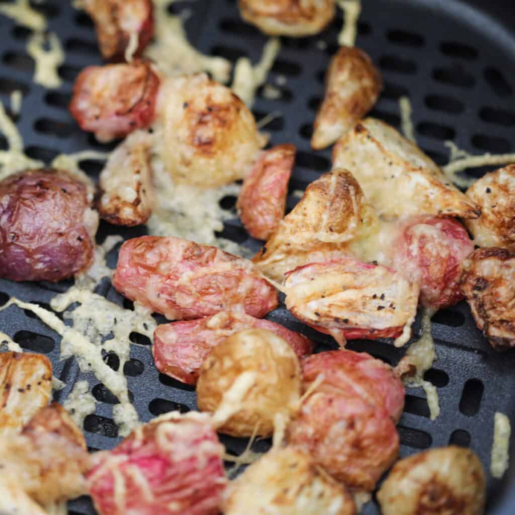 air fryer radishes cooking with parmesan