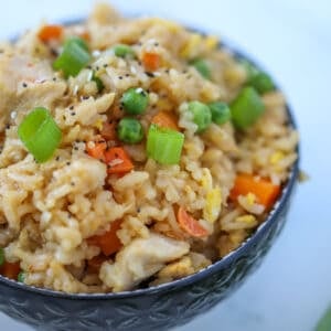 chicken fried rice air fryer recipe with garnish in a bowl