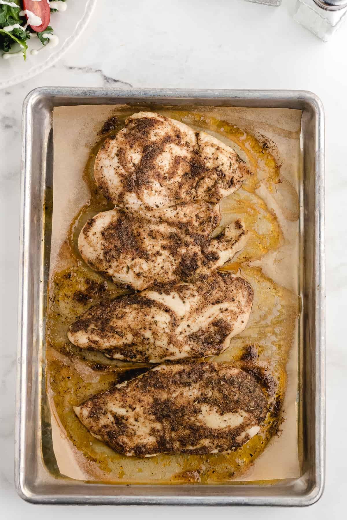 bake the thin chicken breast in oven on a sheetpan answers the question how long to bake thin chicken breast