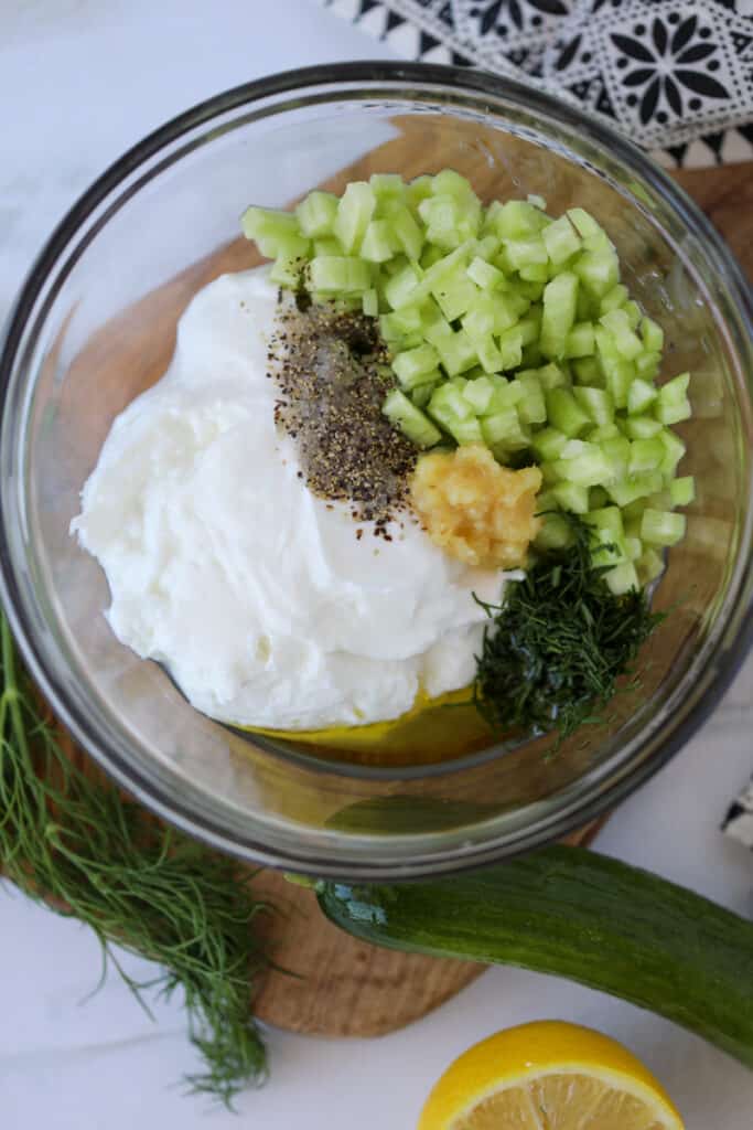 the keto tzatziki sauce ingredients in a bowl before combining