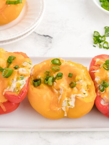 tuna melt stuffed peppers recipe lined up on a tray ready to serve