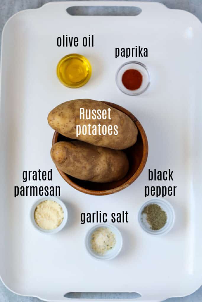 air fryer potato wedges ingredients on a tray