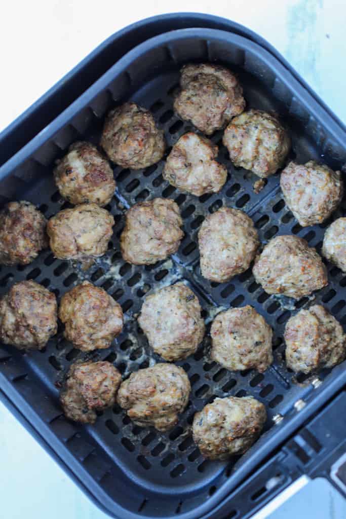 cooking meatballs in air fryer in the air fryer basket