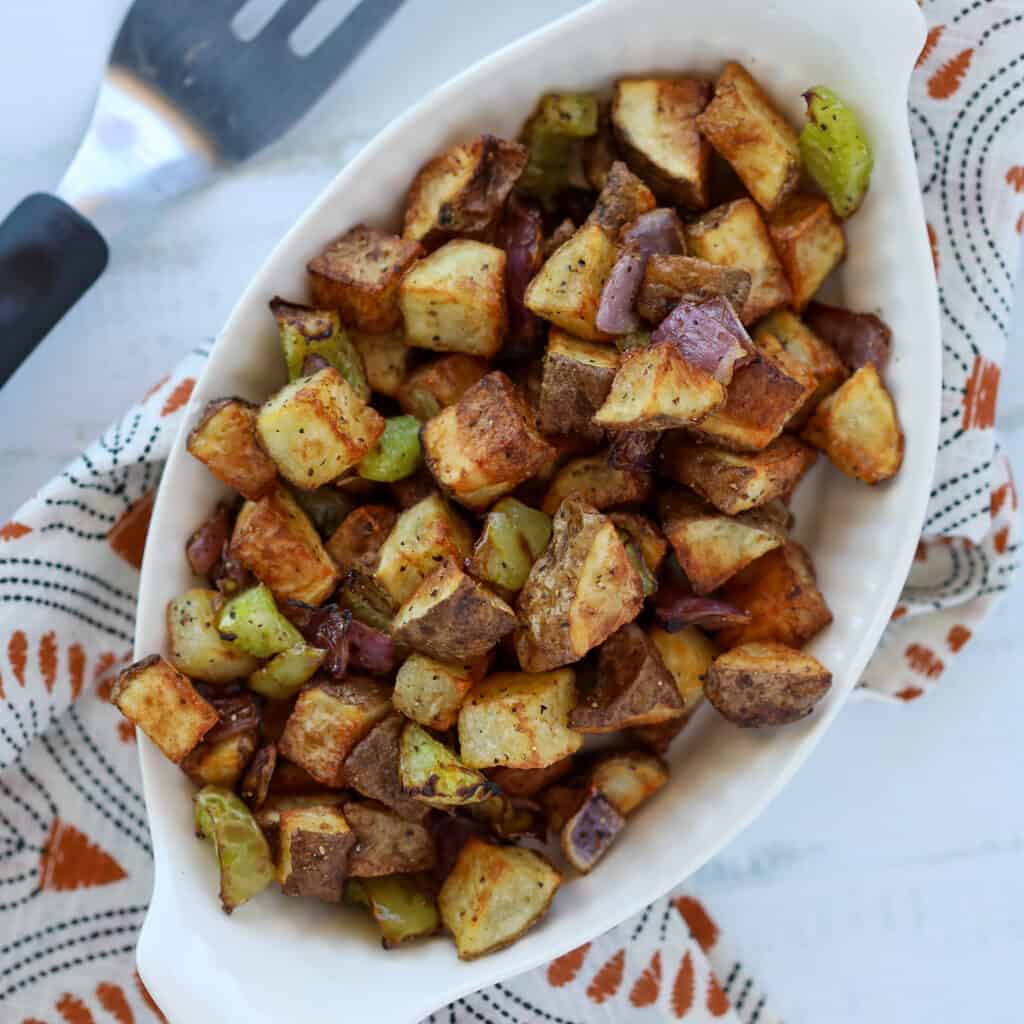 air fryer home fries in a white bowl