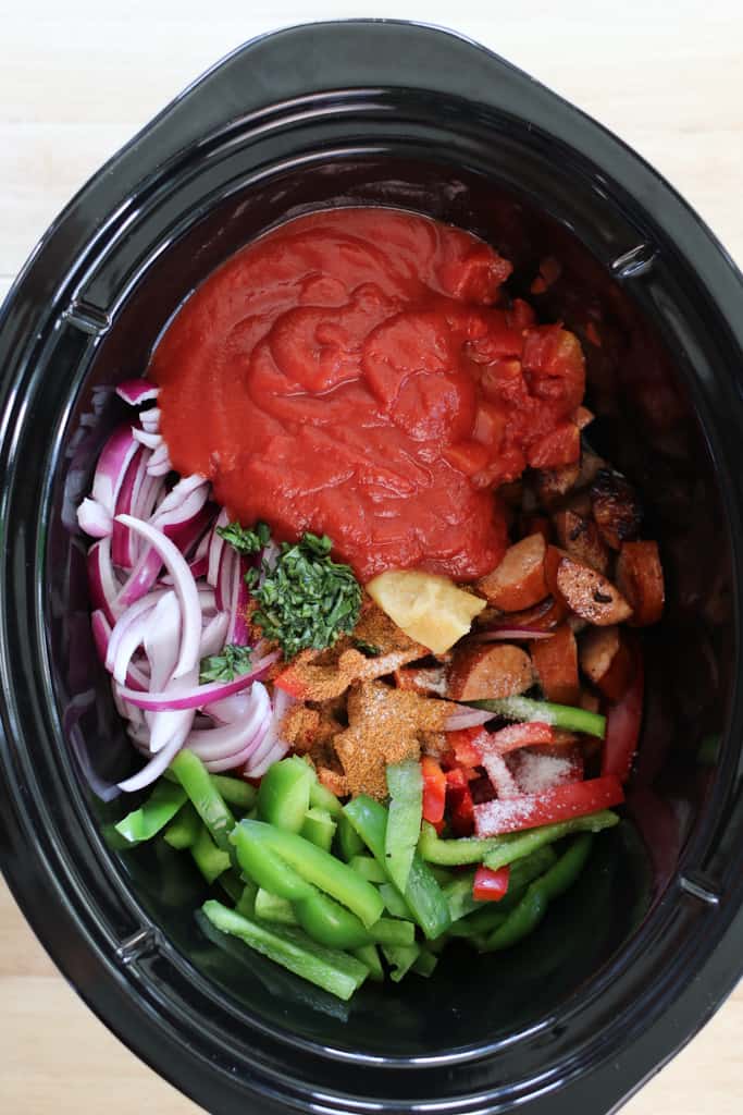 crockpot kielbasa recipe in the slow cooker with sausage peppers and onions