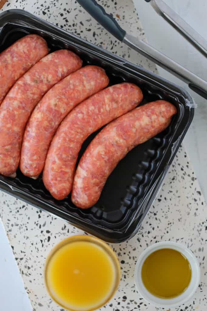 italian sausage instant pot ingredients on a cutting board
