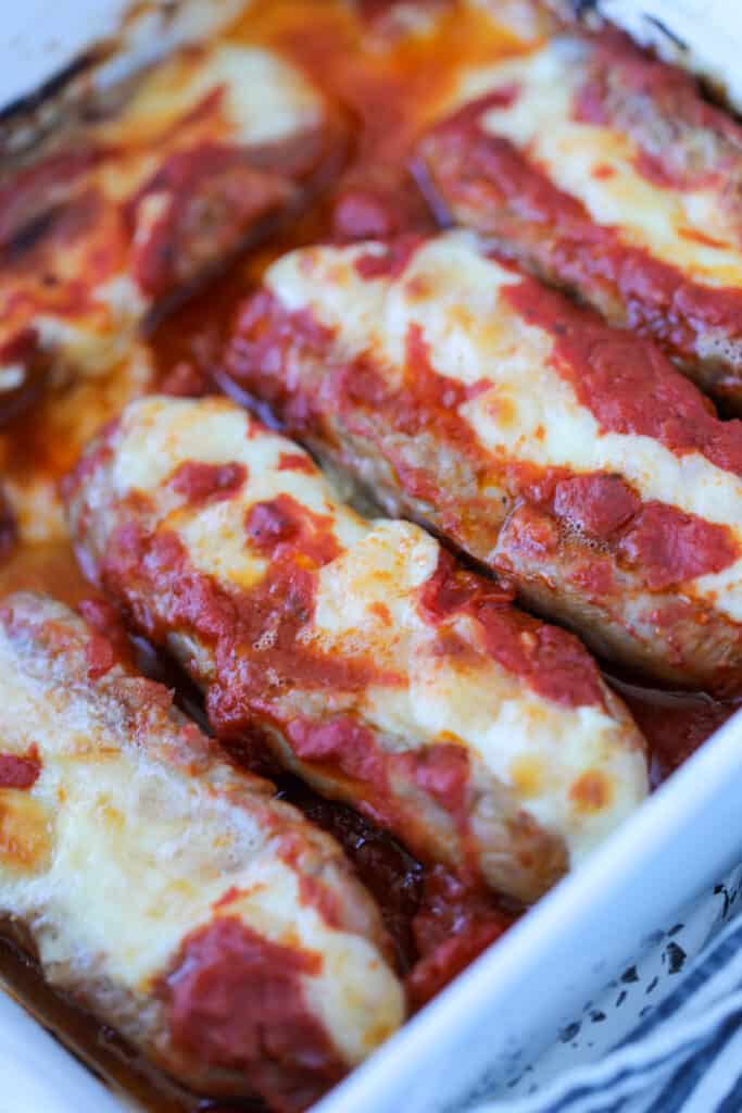 baked stuffed sausages with melted cheese
