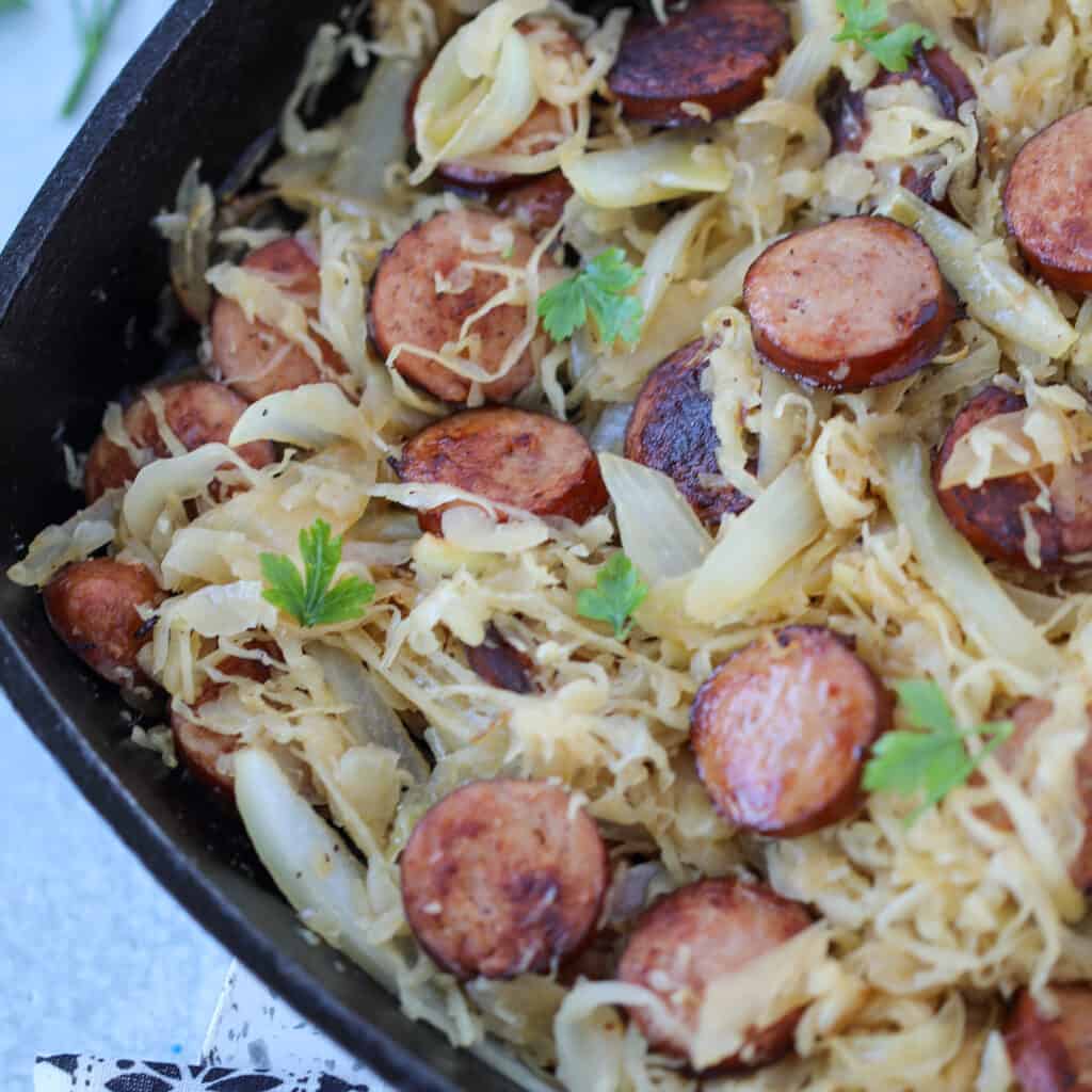 learn how to cook kielbasa on the stove with sauerkraut and seasonings
