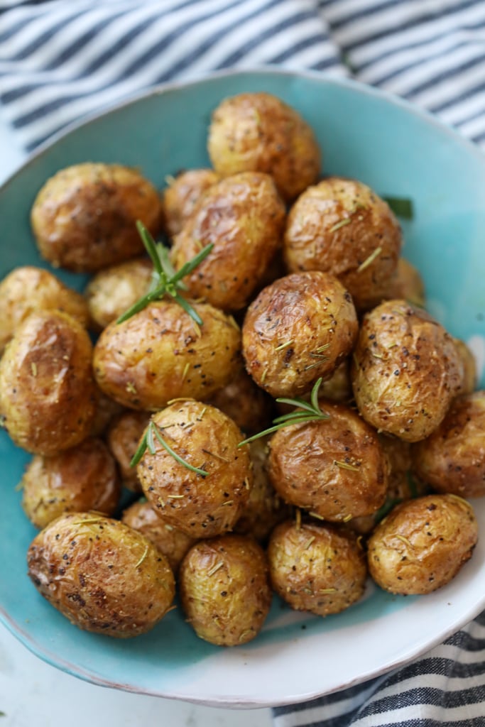 roasted air fryer baby potatoes in a blue bowl 