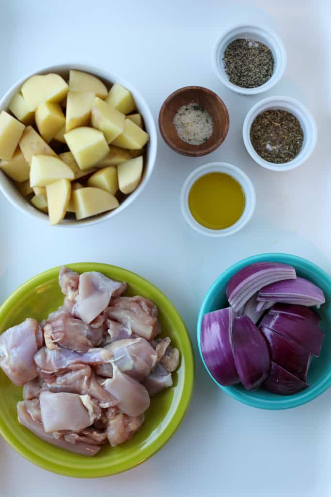 boneless chicken thighs in air fryer ingredients on a white tray