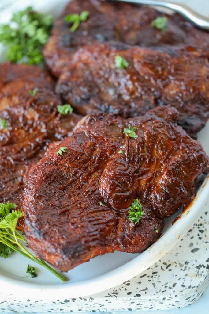 pork shoulder steak marinade after cooking with bbq sauce brushed on