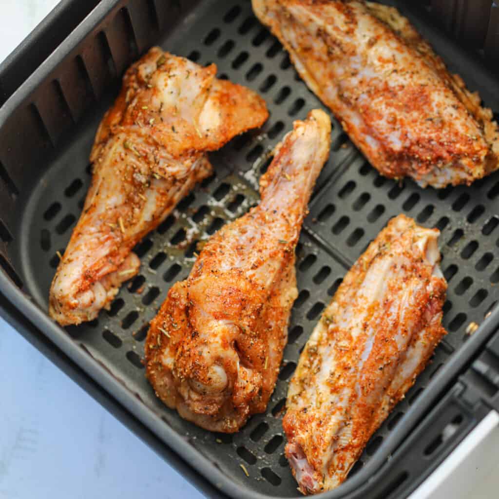 crispy air fried turkey wings in air fryer basket
