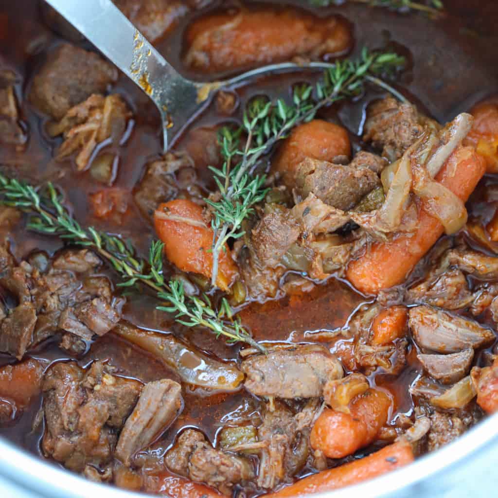 beef stew with beer in a pressure cooker