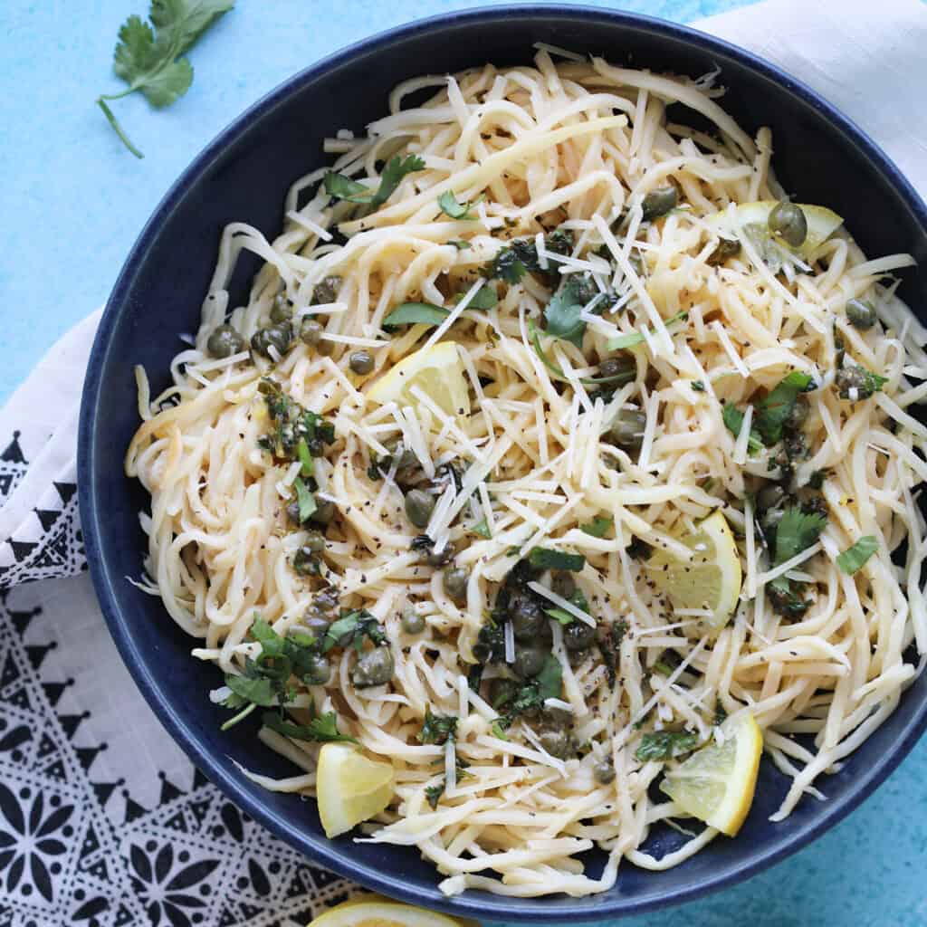 caper pasta dish done and served in a dish
