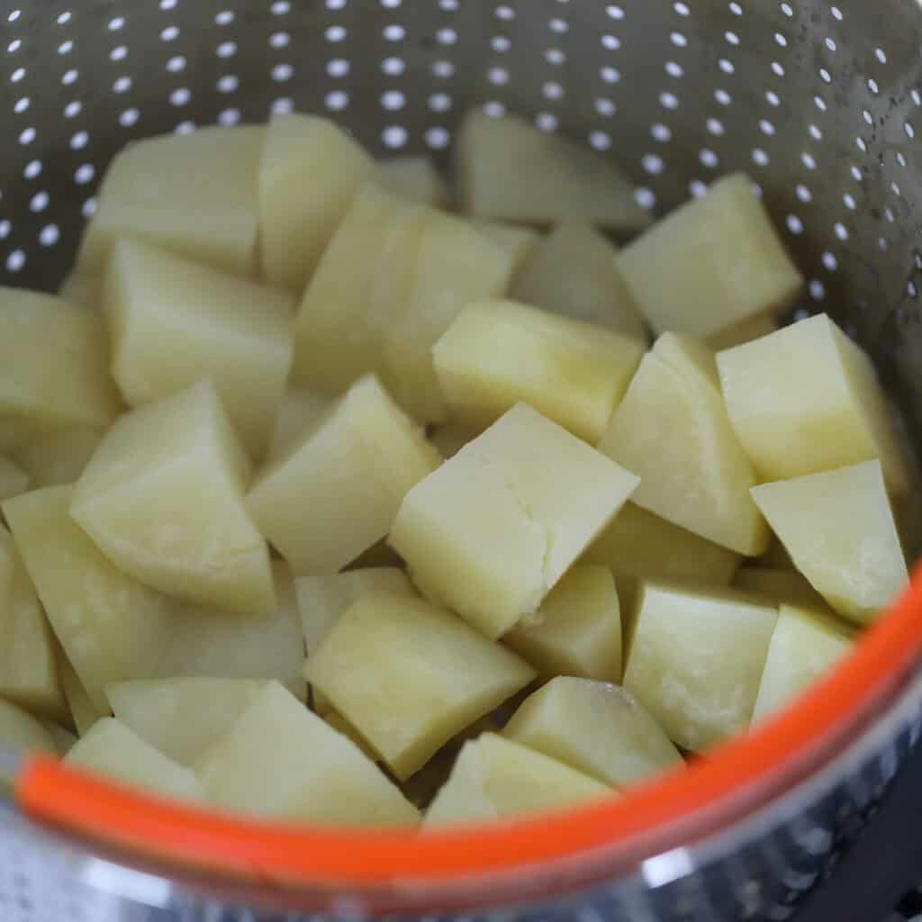 diced potatoes in instant pot basket after cooking