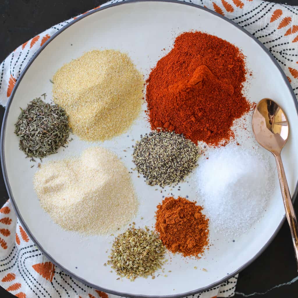 homemade blackening seasoning on a white plate before combining