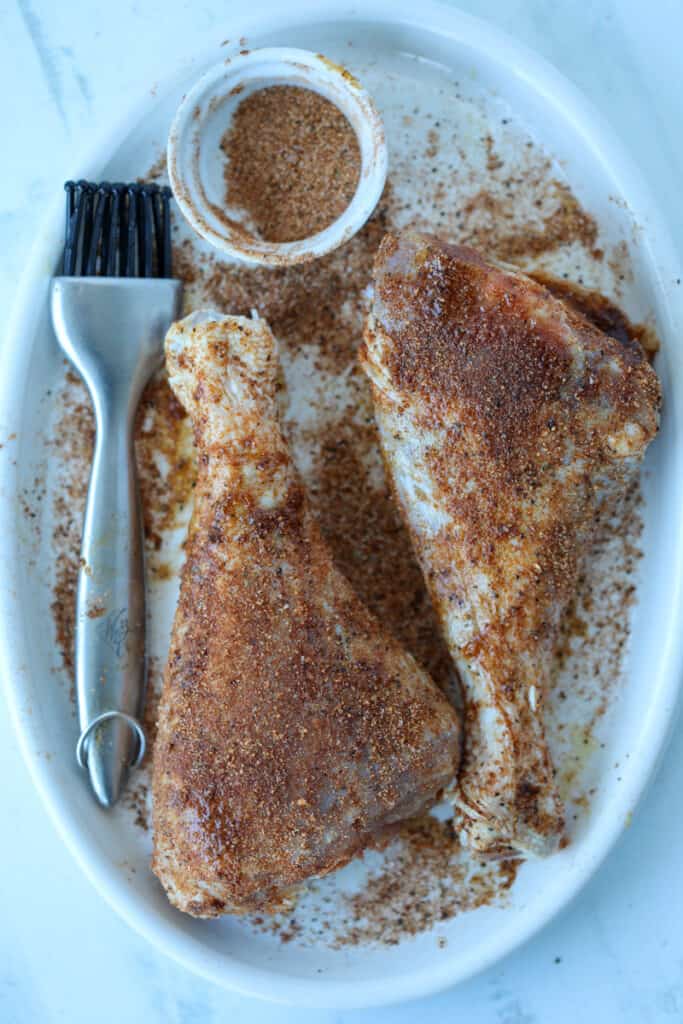 brush <span style='background-color:none;'>olive oil</span><span style='background-color:none;'> </span>and rub on the turkey legs air fryer recipe before cooking