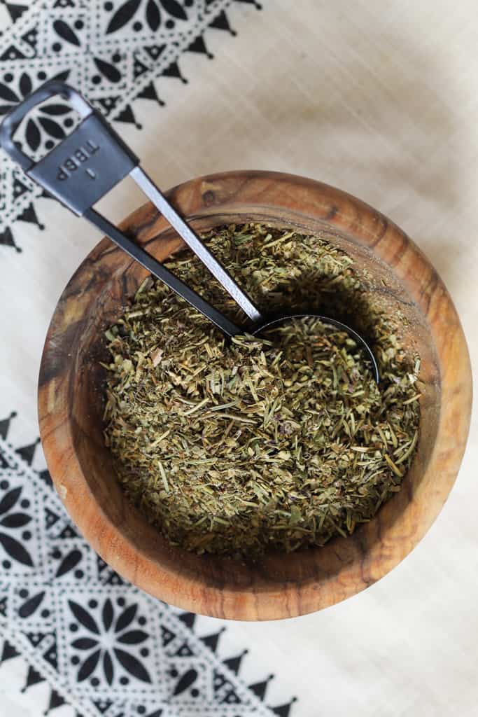 substitute for italian seasoning mixed in a wooden bowl