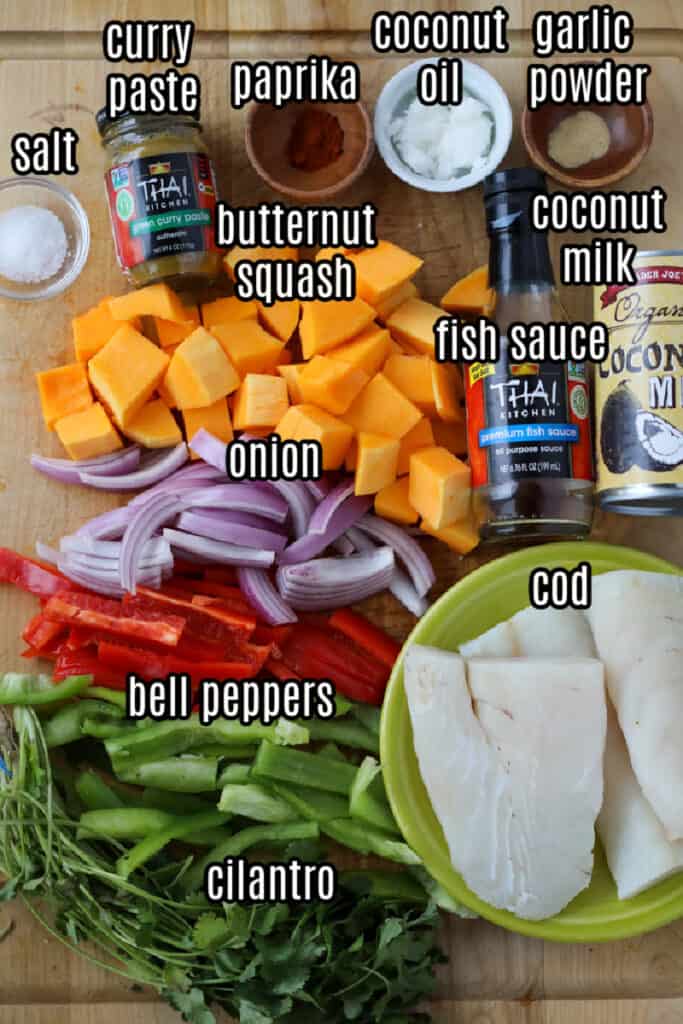 thai fish curry with coconut milk ingredients on a tray
