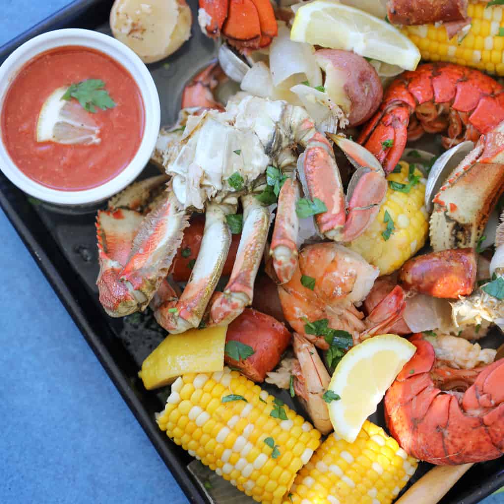 seafood on a baking sheet after cooking seafood boil recipe