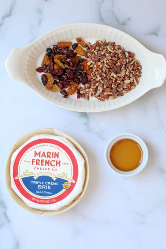air fryer baked brie ingredients on a white background