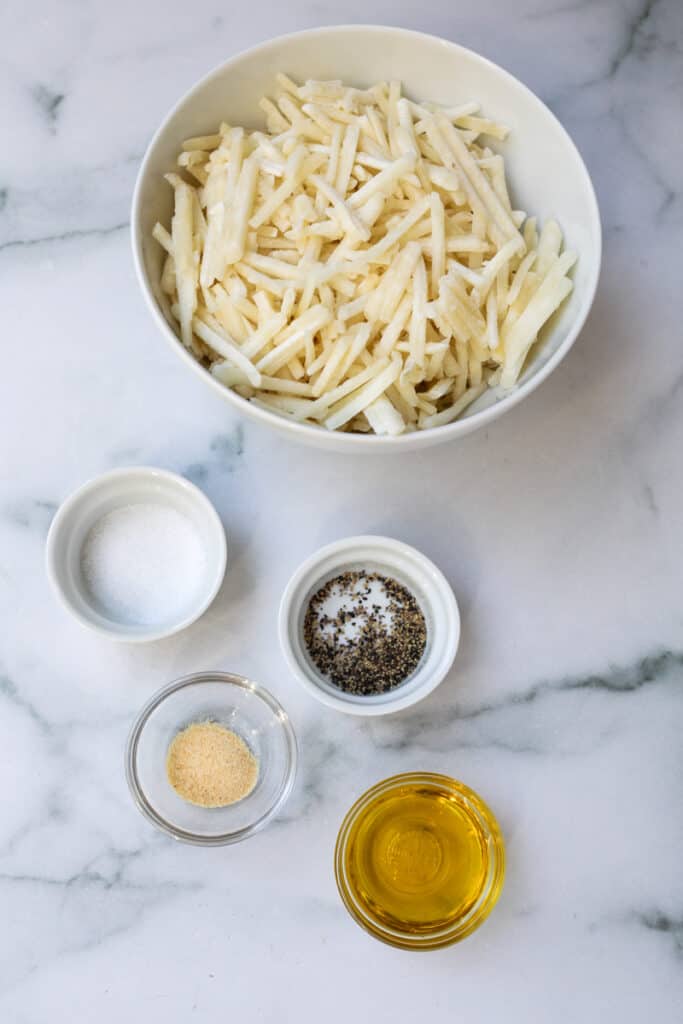 air fryer frozen hashbrowns ingredients on a white counter