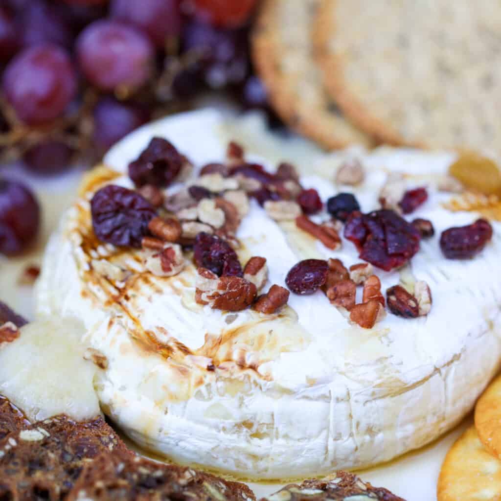 brie in air fryer recipe with honey pecans and cranberries