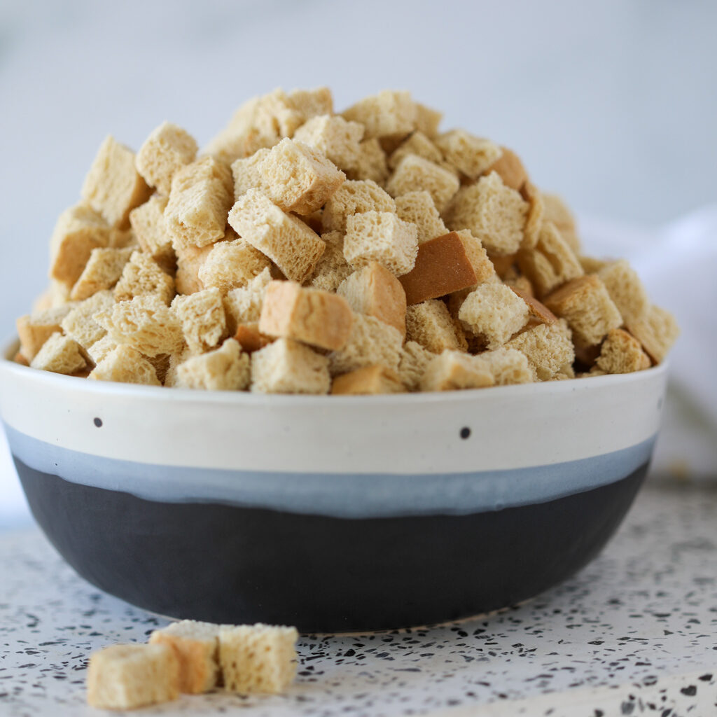dried bread cubes in a bowl after baking 