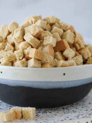 dried bread cubes in a bowl after baking