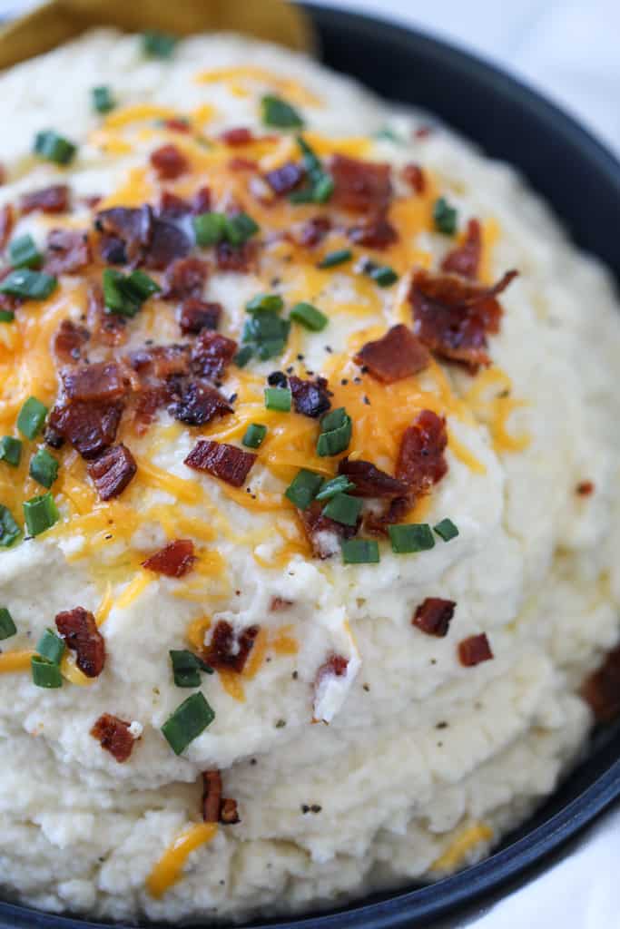 keto cauliflower mashed potatoes loaded with bacon and cheese