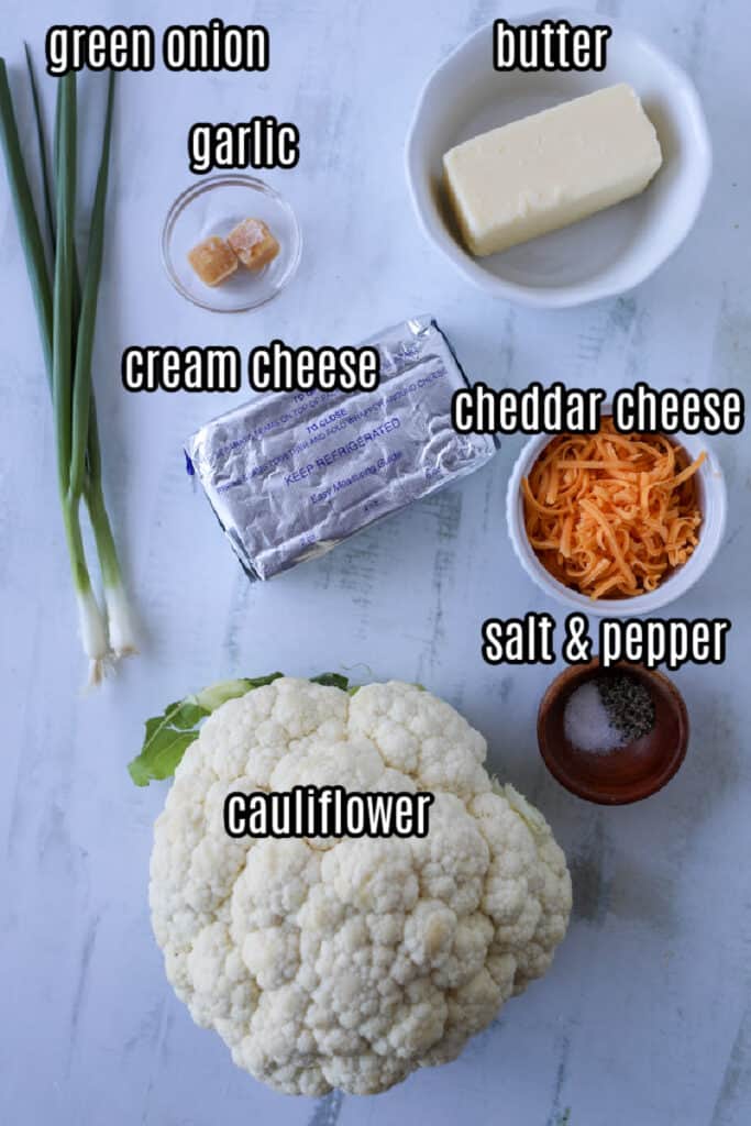 keto mashed cauliflower recipe ingredients on a white tray