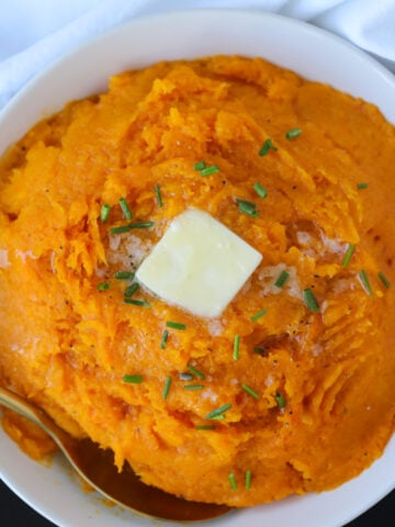 mashed butternut squash keto in a white bowl ready to serve