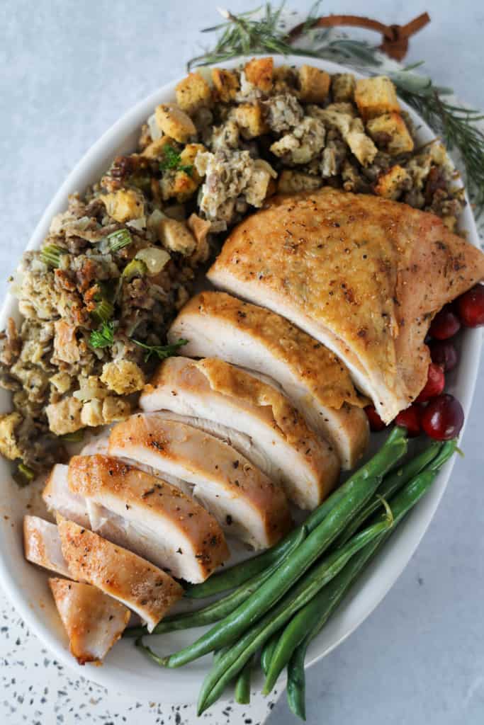 smoked turkey breast no brine recipe after smoking on a platter
