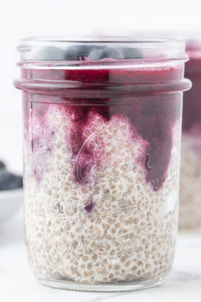 chia seed pudding with almond milk in mason jars for meal prep