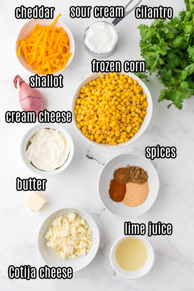 Mexican elotes dip ingredients on a white background