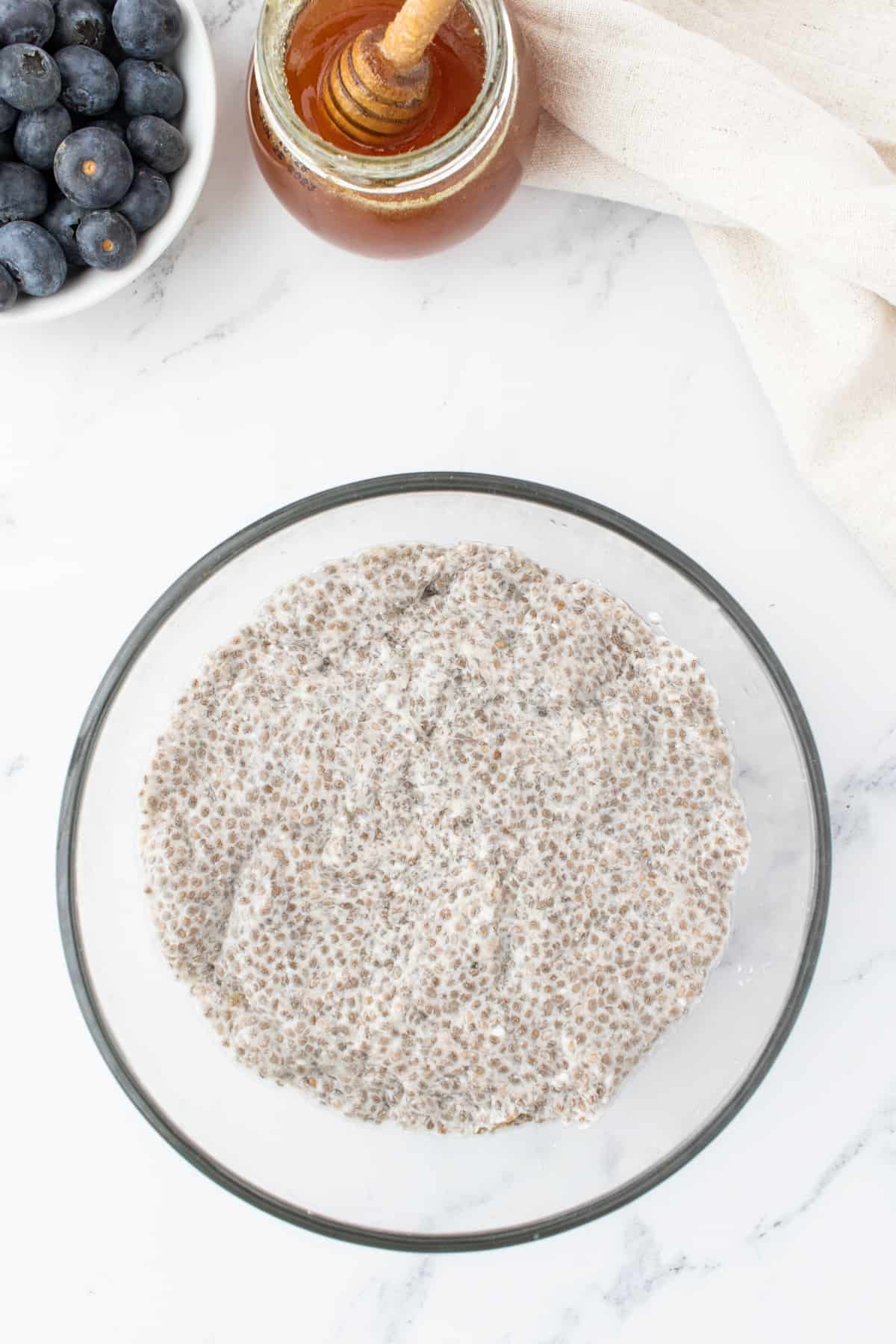 healthy chia seed puddings after they've set in the fridge